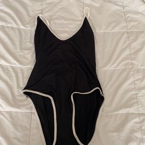 Black and white body suit